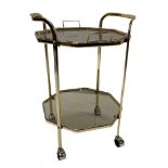 Art Deco style gilt brass two tier octagonal gilt brass drinks trolley, with inset smoked glass tray