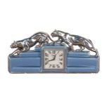 French Art Deco ceramic figural clock, mounted by two panthers, square silver dial with subsidiary