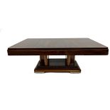 Mid-century continental rosewood coffee table, moulded top on six columns, stepped square plateau