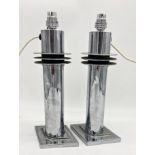 Pair of Deco chrome Hollywood chic metropolis type desk lamps, on stepped diamond bases, 47cm