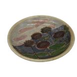 Large studio pottery dish, the interior painted with poppies in a field, 45cm diameter