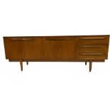 1960s Danish style teak sideboard, fitted with three drawers, twin doors and a fall front, 73cm high