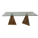 Good quality twin-pillar dining or refectory table, the glass top on a pair of triangular textured