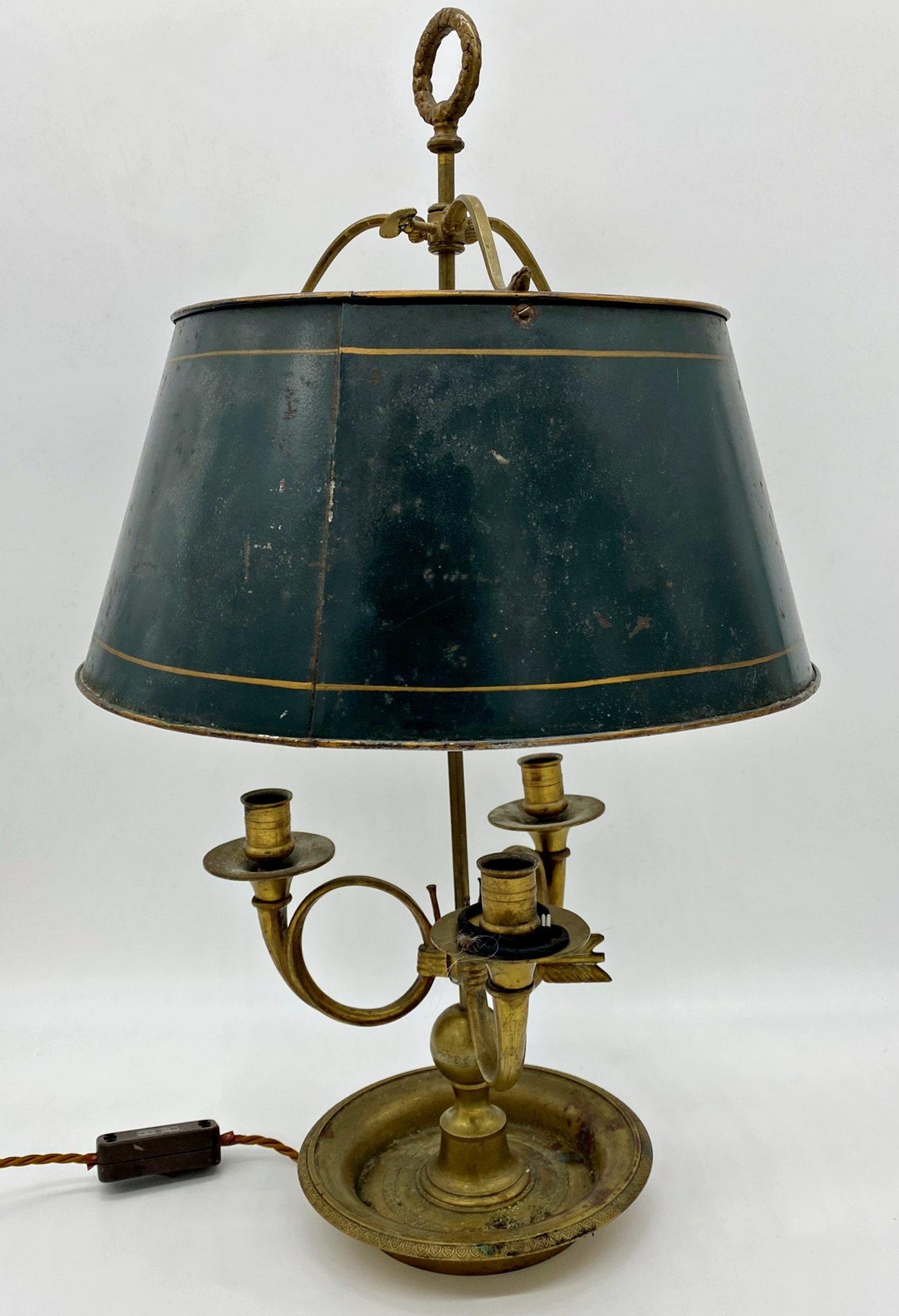 Good quality brass and toleware lamp, with three branch candelabra under a twin electric fitting