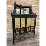 Aesthetic movement corner cabinet the raised back fitted two bevelled mirror panels, the two