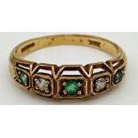 A 9ct gold ring set with White Sapphire and Green Aventurine stones. Size Q 1/2. Weight 2.9 grams