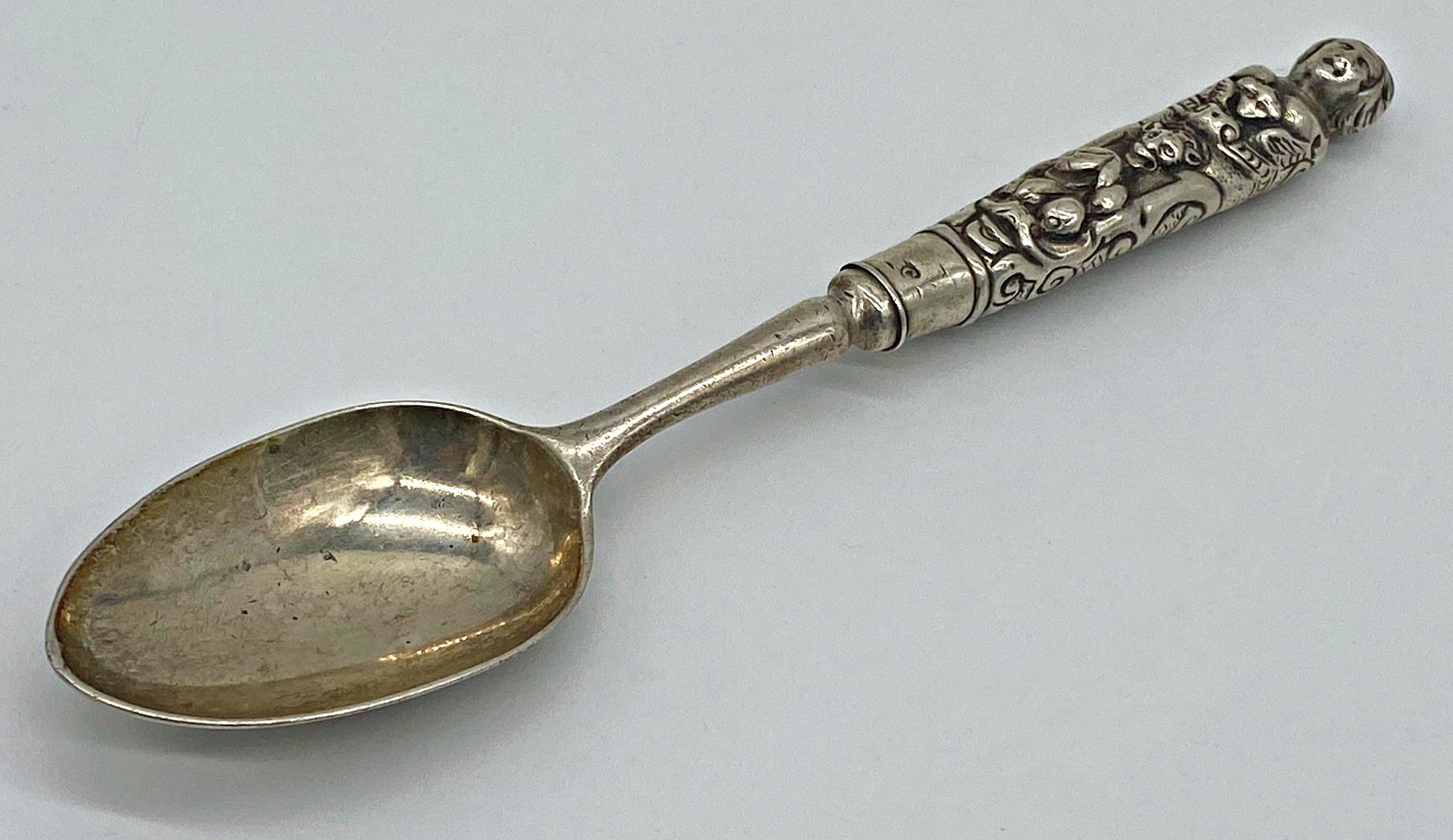 Unusual Victorian silver character spoon, the embossed handle in the form of a lady and devilish