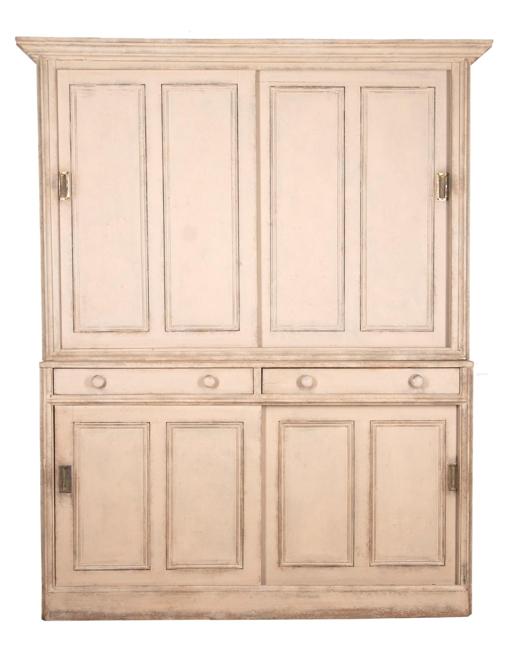19th century painted housekeepers cupboard, the raised back with two slide doors enclosing a shelved
