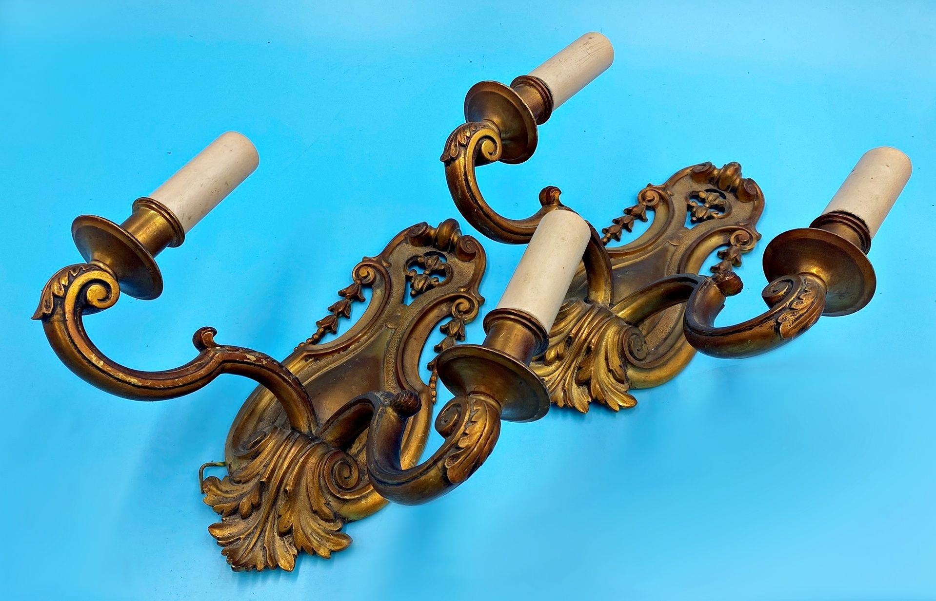 Pair of good quality cast gilt twin branch wall lights, 30 high x 27 cm wide (2)