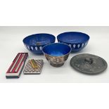 Pair of Norwegian enamelled serving dishes with geometric feather decoration on blue ground in the