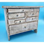 Provincial washed pine table top apprentice type chest of small drawers, 29 high x 37 cm wide