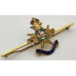 Gold bar brooch decorated with enamel to the emblem for the Sherwood Foresters of Notts & Derby