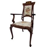Art Nouveau walnut and boxwood inlaid salon carver chair, with scrolled organic frame and