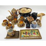 A mixed collection of oriental items to include a satsuma tea service, a carved wooden dog of Fo,