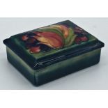 Moorcroft pottery rectangular lidded box, the lid decorated grapes and leaves, inscribed "W