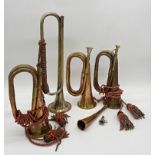 A collection of military horns, to include a copper and brass horn for the Royal Welsh Fusiliers