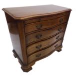 Georgian style mahogany serpentine chest fitted with a brush slide and four long graduated drawers