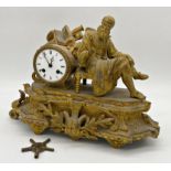 Late 19th century French gilt spelter figural clock, the twin train drum head movement next to a