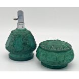 Unusual carved malachite dressing set pieces, to include a perfume bottle and lidded powder jar,