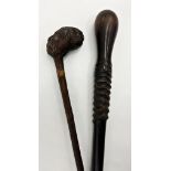Heavy primitive antique walking stick with concealed cudgel, with a further antique cane the knop