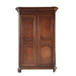 Massive 19th century French fruitwood armoire, moulded cornice over fancy panelled doors enclosing a