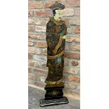 Chinoiserie wooden cut-out of a standing robed gentleman upon a stepped base with gilt highlights,