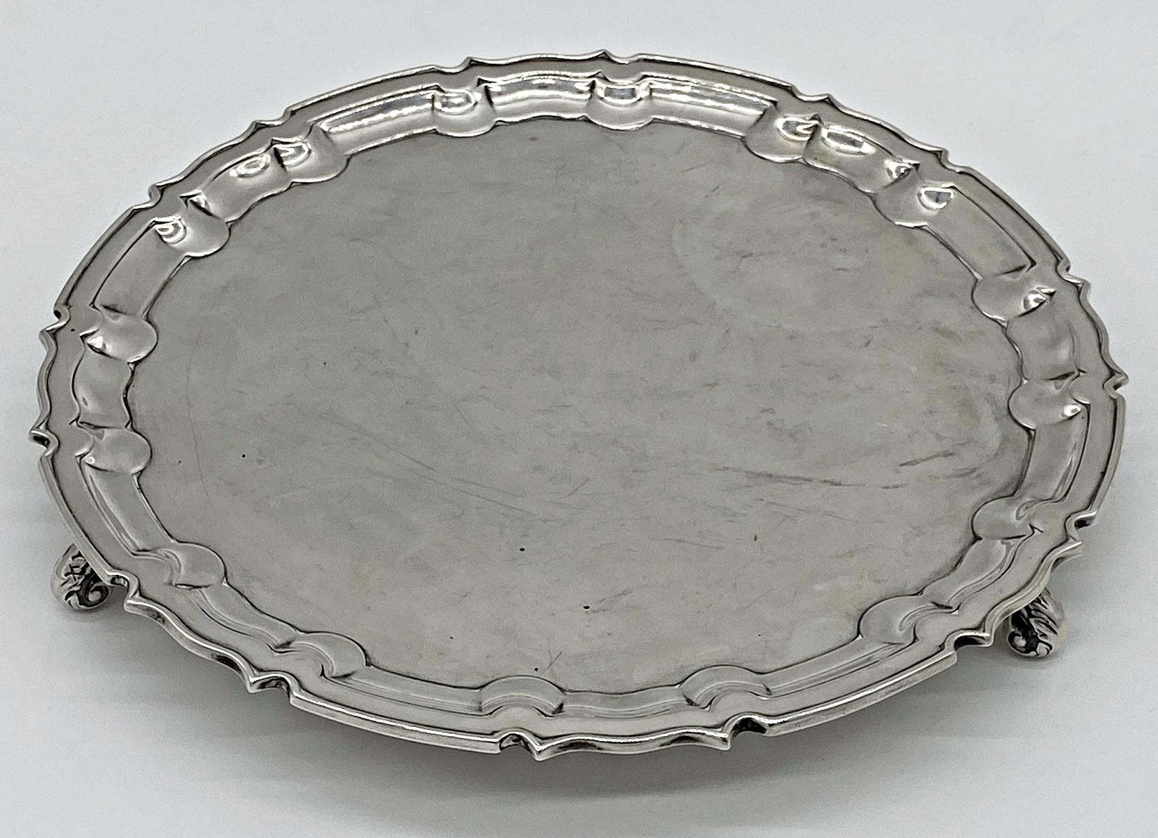 Early 20th century silver salver on scrolled feet, maker William Hutton & Sons, Sheffield 1914, 26cm