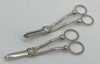 Two pairs of grape scissors, one silver the other silver plate (2)