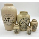 Graduated set of five Virol Bone Marrow stoneware jars, the largest 32cm high