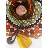 Three agate bead necklaces, an agate bangle, a dyed coral bead necklace, a reconstituted amber