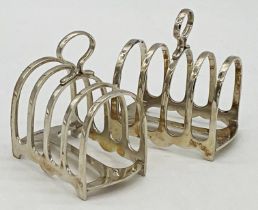 Good pair of 1930s cast silver four divisional toast racks, maker Mappin & Webb, Sheffield 1939, 8.