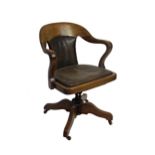 Good quality Edwardian oak revolving desk chair, with leather upholstery, 90cm high