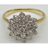 An 18ct diamond cluster ring with 19 .05ct diamonds in a white gold setting. Size K, 3.1g approx
