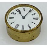 A simple French brass drum head movement, enamel dial with Roman numerals, 9.5cm diameter