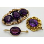 A 9ct gold brooch set with a central Amethyst coloured paste stone, a gilded metal brooch set with