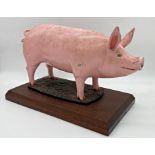 Early 20th century butcher's shop window advertising model of a standing pig upon an oak plinth