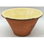 Good large antique terracotta dairy bowl with yellow glazed interior, 27cm high x 48cm diameter