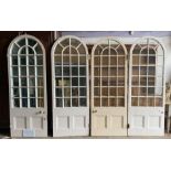 Set of four Georgian arched interior doors, two fitted with mirror panels, 135cm high x 87cm wide