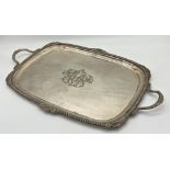 Very large silver plated twin handled tray, with cast scallop shell boarders, by Walker & Hall, 76cm