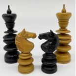 Complete and part complete boxwood and ebony chess sets in the manner of Calvert