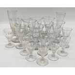 A harlequin collection of Georgian and later faceted drinking glasses