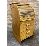 Sweet early 20th century golden oak students bureau, with tambour front, concealed work surface