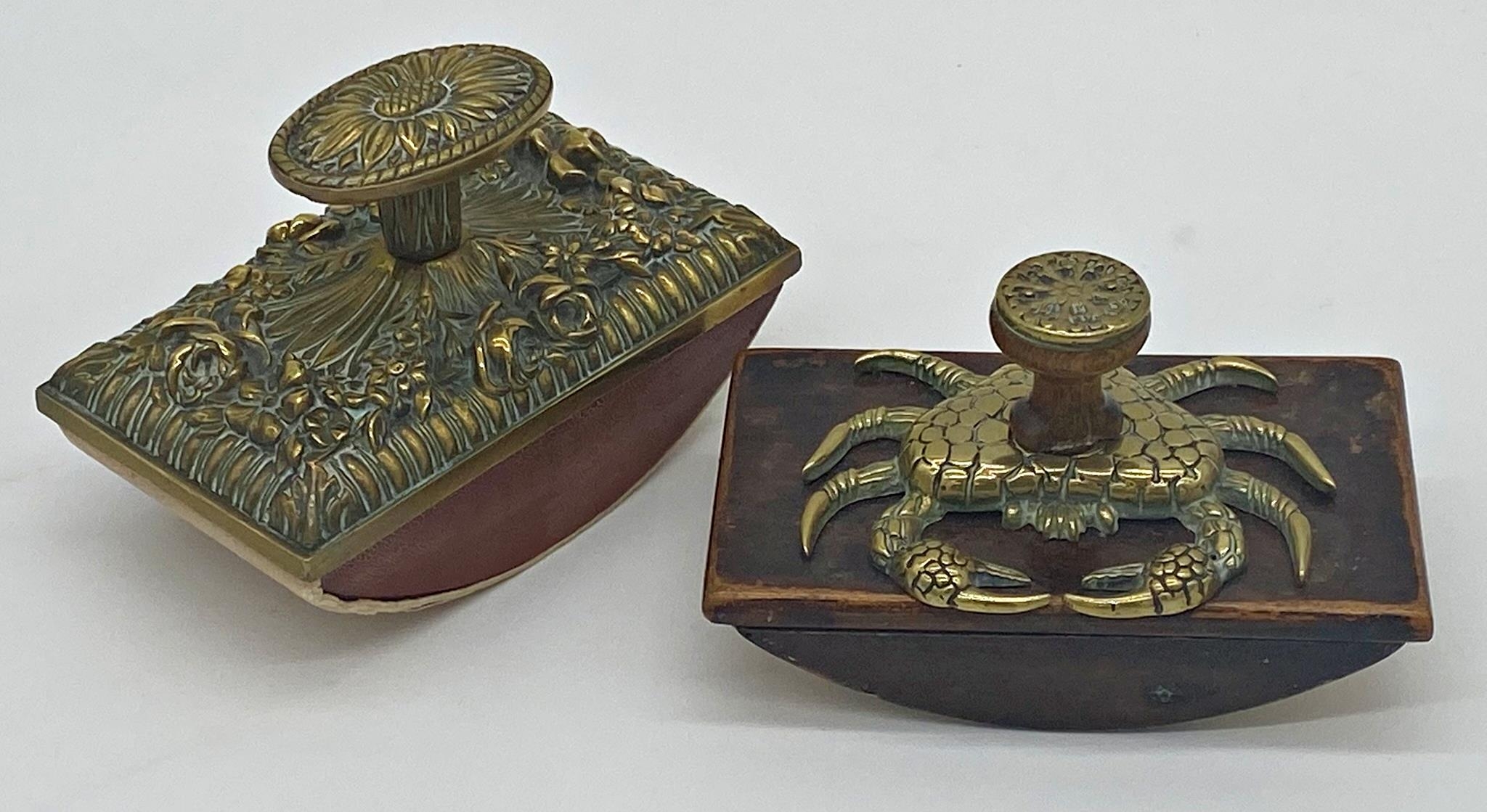 Unusual novelty blotter the top mounted by a brass crab together with a further embossed brass