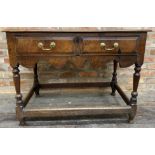 Georgian oak side table, fitted two drawers with wavy apron and turned legs, supported by a canted