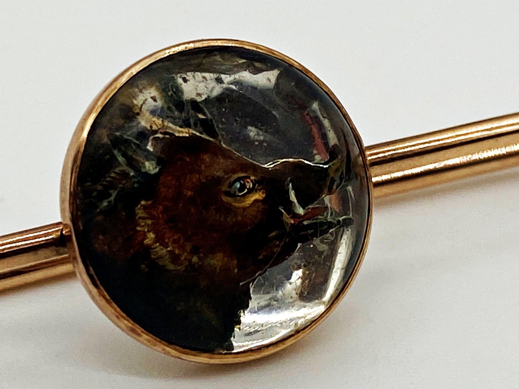 A yellow metal bar brooch, the central panel set with a painted and intaglio carved Essex crystal - Image 2 of 3