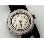Art Deco silver dress watch, 27mm case, guilloche enamel bezel, silvered dial with Arabic