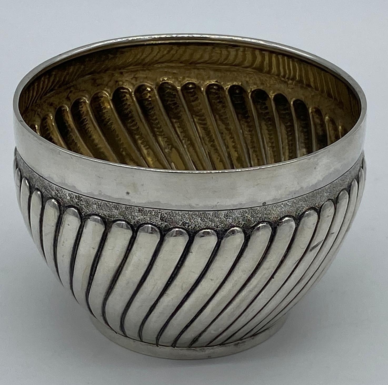 Victorian wrythen fluted silver slop bowl, maker F B Thomas & co, London 1882, 10cm diameter, 5oz