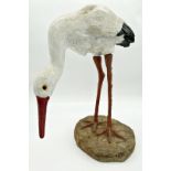 Good painted stone and iron garden stork, 50cm high