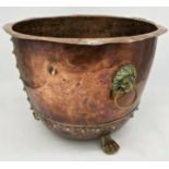 Good antique riveted copper log bin, twin brass lion head ring handles, cast paw feet, 36cm high x