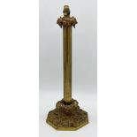 Exceptional quality cast brass table lamp, with cast floral borders upon a stepped octagonal base,